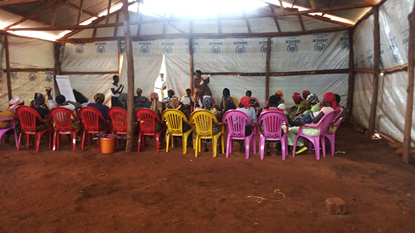 Refugee women in Nyarugusu Refugee Camp in Tanzania participate in the CWS program. Photo: Davide Prata / CWS