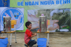 A-little-boy-practice-handwashing-at-hygiene-awareness-raising