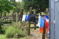 Migrants arrive at Las Lajas, in the Darien province, in Panama, with their clothes wet and full of mud.