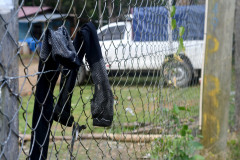 Migrants arrive at Las Lajas, in the Darien province, in Panama, with their clothes wet and full of mud.