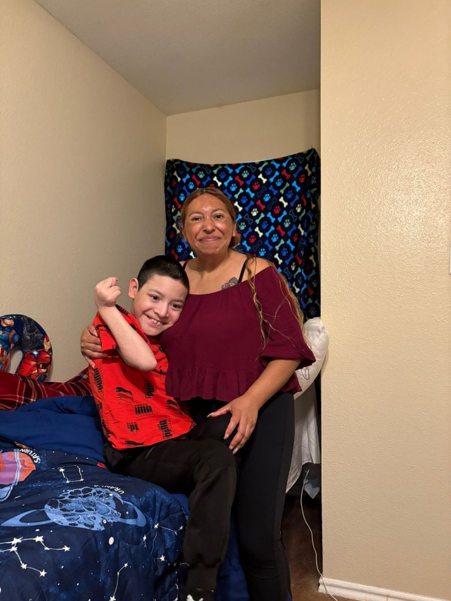 Denia and Yordy next to adjustable bed that was donated to Yordy Denia and Yordy next to adjustable bed that was donated to Yordy