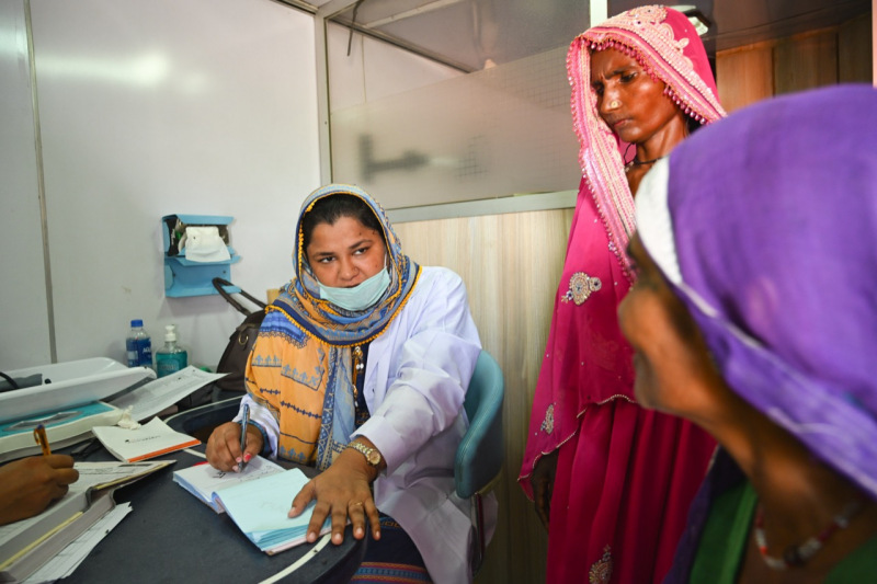 Dr.-Anila-sees-patients-coming-on-from-flood-affected-villages